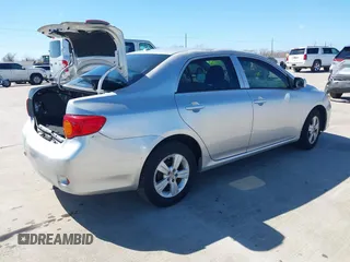 2010 Toyota Corolla with VIN JTDBU4EE1AJ081014, listed as a IAAI auction lot 41661610 with 86,823 mi miles. Bid and sale history available at carsss.com. Image 4.