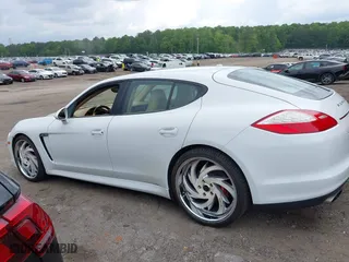 2013 Porsche Panamera with VIN WP0AA2A72DL014124, listed as a IAAI auction lot 42115410 with 184,206 mi miles. Bid and sale history available at carsss.com. Image 14.