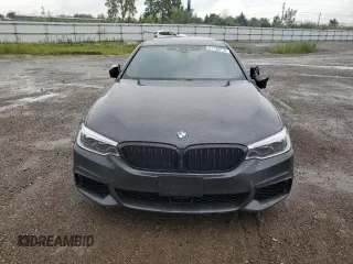 2020 BMW 5 Series M550i xDrive with VIN WBAJS7C06LCD12779, listed as a Copart auction lot 61136215 with 81,286 mi miles and Salvage title. Bid and sale history available at DreamBid. Image 5.