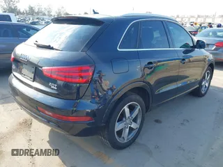 2015 Audi Q3 Premium Plus с VIN WA1EFCFSXFR007096, выставлен на аукционе IAAI как лот 42781603 с пробегом 156 717 миль миль и . История ставок и продаж доступна на DreamBid. Изображение 4.