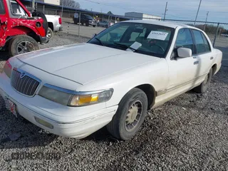 1997 Mercury Grand Marquis LS with VIN 2MELM75W5VX715872, listed as a IAAI auction lot 41612631 with 202,743 mi miles and . Bid and sale history available at DreamBid. Image 2.