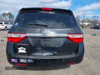 2011 Honda Odyssey EX with VIN 5FNRL5H4XBB011918, listed as a IAAI auction lot 42056043 with 201,821 mi miles and . Bid and sale history available at carsss.com. Image 16.