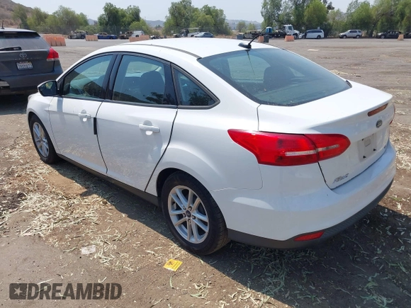 2016 Ford Focus SE z VIN 1FADP3F24GL268619, wystawiony jako IAAI lot #42750298 z przebiegiem 96 587 mil mil oraz . Historia ofert i sprzedaży dostępna na DreamBid. Obrazek 3.