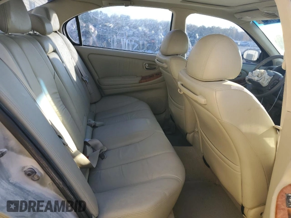 2002 Infiniti I35 Luxury with VIN JNKDA31A62T014458, listed as a Copart auction lot 77677764 with 169,007 mi miles and Salvage Title. Bid and sale history available at DreamBid. Image 10.