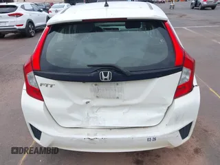 2016 Honda Fit LX z VIN JHMGK5H51GX038519, wystawiony jako IAAI lot #41809636 z przebiegiem 96 894 mil mil oraz . Historia ofert i sprzedaży dostępna na DreamBid. Obrazek 6.