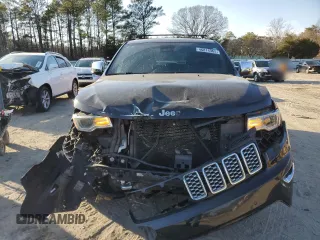 2017 Jeep Grand Cherokee Overland with VIN 1C4RJFCT5HC828780, listed as a Copart auction lot 46874965 with 90,269 mi miles and Salvage Title. Bid and sale history available at carsss.com. Image 5.