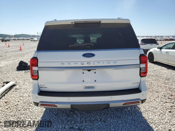 2022 Ford Expedition Max XLT z VIN 1FMJK1HT5NEA58324, wystawiony jako Copart lot #54058565 z przebiegiem Nie podano mil oraz Szkoda całkowita • Salvage title. Historia ofert i sprzedaży dostępna na DreamBid. Obrazek 6.