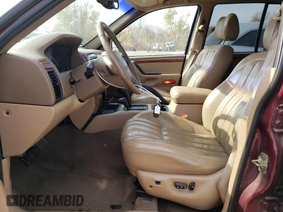 1999 Jeep Grand Cherokee Limited with VIN 1J4GW68S5XC573162, listed as a Copart auction lot 78611274 with 174,960 mi miles and Salvage Title. Bid and sale history available at carsss.com. Image 7.
