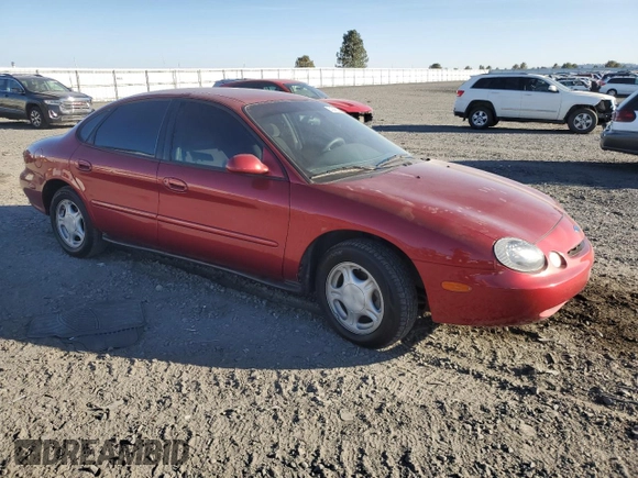 1997 Ford Taurus GL z VIN 1FALP52U6VA301952, wystawiony jako Copart lot #74245204 z przebiegiem 152 562 mil mil oraz Szkoda całkowita • Salvage title. Historia ofert i sprzedaży dostępna na DreamBid. Obrazek 4.