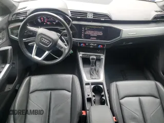 2019 Audi Q3 Premium z VIN WA1AECF32K1075590, wystawiony jako Copart lot #52745635 z przebiegiem 69 256 mil mil oraz Szkoda całkowita • Salvage title. Historia ofert i sprzedaży dostępna na DreamBid. Obrazek 8.