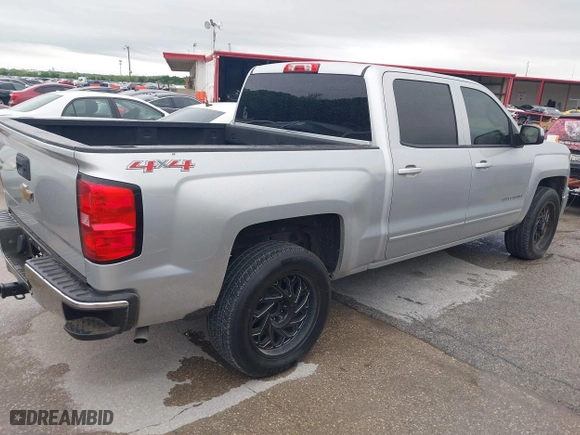 2015 Chevrolet Silverado 1500 LT with VIN 3GCUKREH6FG334200, listed as a IAAI auction lot 41953563 with 201,177 mi miles. Bid and sale history available at carsss.com. Image 4.