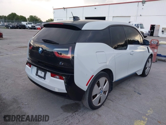 2015 BMW i3 with VIN WBY1Z4C59FV503755, listed as a IAAI auction lot 41303560 with Not provided miles and . Bid and sale history available at DreamBid. Image 4.