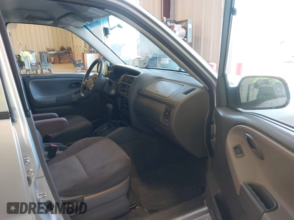 2003 Chevrolet Tracker z VIN 2CNBE13C336953203, wystawiony jako IAAI lot #42195810 z przebiegiem 123 503 mil mil oraz . Historia ofert i sprzedaży dostępna na DreamBid. Obrazek 5.