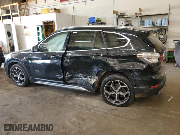 2018 BMW X1 xDrive28i with VIN WBXHT3C31J5L24230, listed as a Copart auction lot 56665305 with Not provided miles and Non repairable. Bid and sale history available at DreamBid. Image 2.