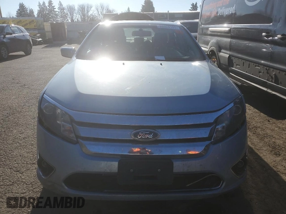 2010 Ford Fusion Hybrid with VIN 3FADP0L36AR288813, listed as a Copart auction lot 52039765 with 184,238 mi miles and Salvage title. Bid and sale history available at DreamBid. Image 5.