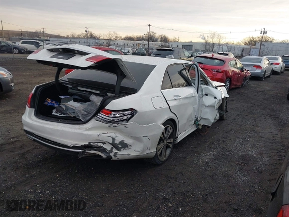 2016 Mercedes-Benz E 350 Sport with VIN WDDHF5KB6GB237450, listed as a IAAI auction lot 41297976 with 60,573 mi miles and . Bid and sale history available at DreamBid. Image 4.