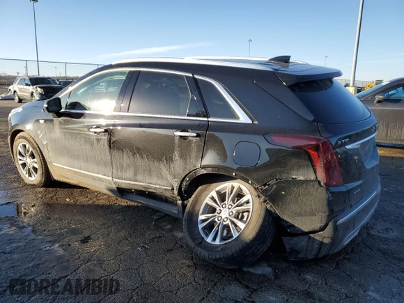 2021 Cadillac XT5 AWD Premium Luxury with VIN 1GYKNDRS6MZ111640, listed as a Copart auction lot 46567035 with 57,484 mi miles and Salvage Title. Bid and sale history available at DreamBid. Image 2.
