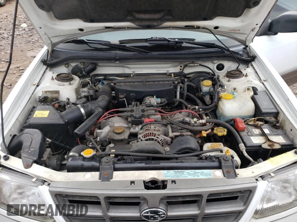 1999 Subaru Forester S with VIN JF1SF6555XH730230, listed as a Copart auction lot 71795924 with 103,455 mi miles and Salvage Title. Bid and sale history available at carsss.com. Image 12.
