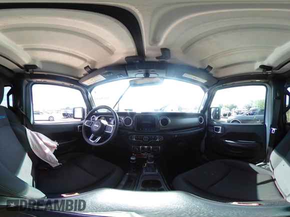 2023 Jeep Wrangler Rubicon with VIN 1C4JJXR63PW703424, listed as a IAAI auction lot 42639653 with 46,412 mi miles and . Bid and sale history available at DreamBid. Image 17.