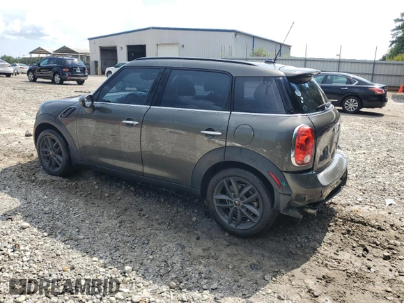 2014 MINI Countryman S with VIN WMWZC3C57EWP25099, listed as a Copart auction lot 62646555 with 153,059 mi miles and Salvage title. Bid and sale history available at DreamBid. Image 2.