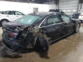 2015 Audi A8 4.0T z VIN WAU32AFD0FN017865, wystawiony jako Copart lot #37065594 z przebiegiem 55 632 mil mil oraz Szkoda całkowita • Salvage title. Historia ofert i sprzedaży dostępna na DreamBid. Obrazek 3.