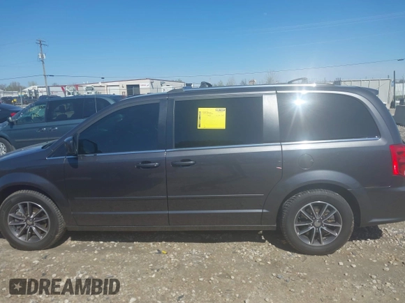 2017 Dodge Grand Caravan SXT with VIN 2C4RDGCG6HR761355, listed as a IAAI auction lot 42204577 with 115,282 mi miles and . Bid and sale history available at DreamBid. Image 14.