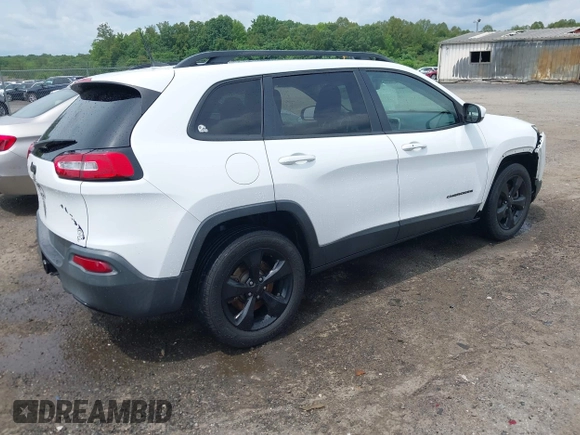 2016 Jeep Cherokee Altitude with VIN 1C4PJMCB3GW121211, listed as a IAAI auction lot 42470241 with 168,343 mi miles and . Bid and sale history available at DreamBid. Image 4.