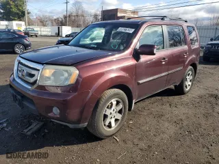 2010 Honda Pilot Touring with VIN 5FNYF4H89AB027347, listed as a Copart auction lot 49927835 with 215,131 mi miles and Clean Title. Bid and sale history available at carsss.com. Image 1.