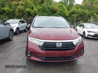 2021 Honda Odyssey Touring with VIN 5FNRL6H88MB006938, listed as a IAAI auction lot 42367022 with 63,280 mi miles and . Bid and sale history available at DreamBid. Image 11.
