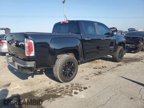 2018 GMC Canyon 2WD with VIN 1GTG5BEN8J1277765, listed as a Copart auction lot 74299244 with 57,042 mi miles and Salvage Title. Bid and sale history available at carsss.com. Image 3.
