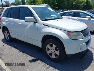 2011 Suzuki Grand Vitara Premium z VIN JS3TD0D2XB4103016, wystawiony jako IAAI lot #42568549 z przebiegiem 156 595 mil mil oraz . Historia ofert i sprzedaży dostępna na DreamBid. Obrazek 1.