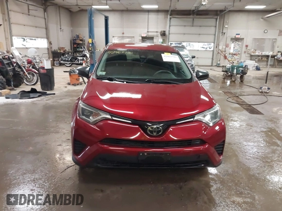 2018 Toyota RAV4 LE with VIN 2T3BFREV9JW825953, listed as a IAAI auction lot 42463780 with 74,128 mi miles and . Bid and sale history available at DreamBid. Image 12.