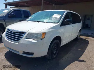 2010 Chrysler Town & Country LX with VIN 2A4RR4DE2AR203953, listed as a IAAI auction lot 41980959 with 347,508 mi miles. Bid and sale history available at carsss.com. Image 2.