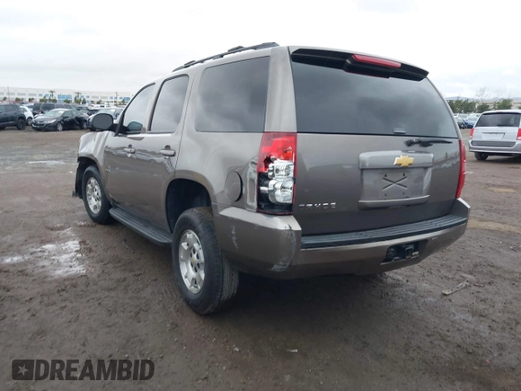 2013 Chevrolet Tahoe LS with VIN 1GNSCAE06DR105066, listed as a IAAI auction lot 41586288 with 161,639 mi miles and . Bid and sale history available at DreamBid. Image 3.