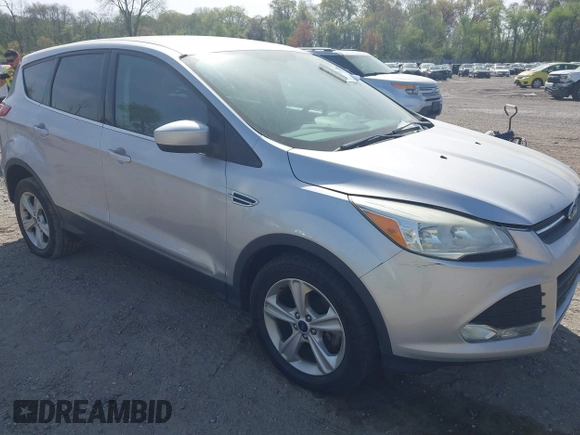 2015 Ford Escape SE with VIN 1FMCU9GX9FUC19545, listed as a IAAI auction lot 42128800 with 157,506 mi miles. Bid and sale history available at carsss.com. Image 1.