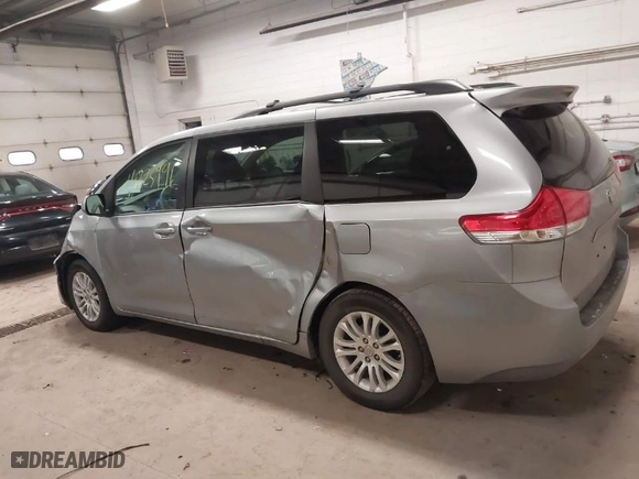 2013 Toyota Sienna XLE AAS with VIN 5TDYK3DC0DS377112, listed as a IAAI auction lot 41225996 with 149,814 mi miles. Bid and sale history available at carsss.com. Image 14.