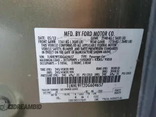 2013 Lincoln MKS EcoBoost with VIN 1LNHL9FT2DG604657, listed as a Copart auction lot 65357735 with 133,548 mi miles and Salvage title. Bid and sale history available at DreamBid. Image 12.
