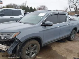 2023 Honda Ridgeline RTL-E with VIN 5FPYK3F70PB030718, listed as a IAAI auction lot 41667869 with 18,768 mi miles. Bid and sale history available at carsss.com. Image 15.