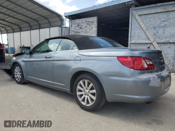 2010 Chrysler Sebring Touring z VIN 1C3BC5ED9AN182007, wystawiony jako Copart lot #51168905 z przebiegiem 124 495 mil mil oraz Szkody całkowita. Historia ofert i sprzedaży dostępna na DreamBid. Obrazek 2.