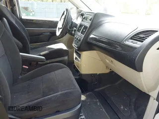 2013 Dodge Grand Caravan SXT with VIN 2C4RDGCG4DR636798, listed as a IAAI auction lot 42240550 with 96,100 mi miles and . Bid and sale history available at DreamBid. Image 5.