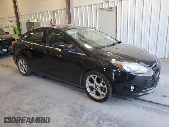 2013 Ford Focus Titanium with VIN 1FADP3J29DL193550, listed as a Copart auction lot 48848985 with 159,294 mi miles and Salvage Title. Bid and sale history available at carsss.com. Image 4.