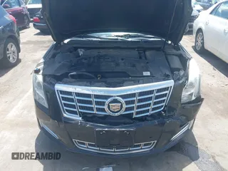 2013 Cadillac XTS Luxury z VIN 2G61P5S37D9101989, wystawiony jako IAAI lot #42242641 z przebiegiem 243 006 mil mil oraz . Historia ofert i sprzedaży dostępna na DreamBid. Obrazek 10.