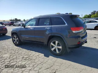 2015 Jeep Grand Cherokee Overland with VIN 1C4RJFCM3FC887817, listed as a Copart auction lot 57420185 with 145,971 mi miles and Clean title. Bid and sale history available at DreamBid. Image 2.