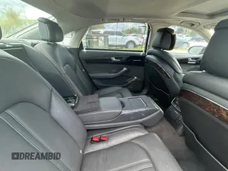 2012 Audi A8 z VIN WAURVAFD6CN015907, wystawiony jako Copart lot #59188515 z przebiegiem 112 879 mil mil oraz Czysty tytuł • Clean title. Historia ofert i sprzedaży dostępna na DreamBid. Obrazek 6.