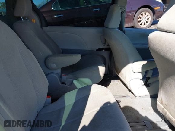 2012 Toyota Sienna with VIN 5TDZK3DC0CS196952, listed as a IAAI auction lot 41674818 with 135,630 mi miles and . Bid and sale history available at DreamBid. Image 8.