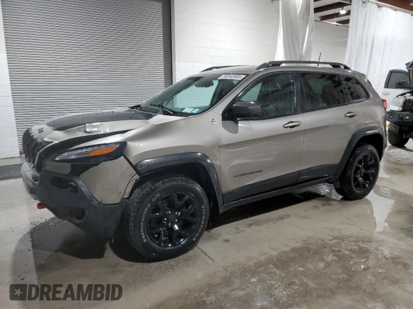 2017 Jeep Cherokee Trailhawk L Plus z VIN 1C4PJMBB4HW593615, wystawiony jako Copart lot #56342885 z przebiegiem 88 215 mil mil oraz Szkoda całkowita • Salvage title. Historia ofert i sprzedaży dostępna na DreamBid. Obrazek 1.