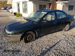1996 Saturn SL with VIN 1G8ZG5281TZ319713, listed as a Copart auction lot 77186594 with 245,847 mi miles and Clean Title. Bid and sale history available at carsss.com. Image 1.