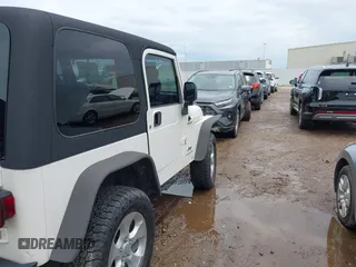 2003 Jeep Wrangler Sport with VIN 1J4FA49S43P362339, listed as a IAAI auction lot 41452901 with 208,128 mi miles and . Bid and sale history available at DreamBid. Image 4.