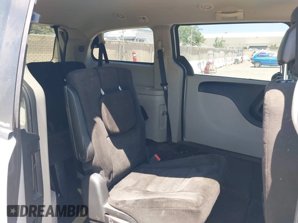 2012 Dodge Grand Caravan SXT with VIN 2C4RDGCG2CR223891, listed as a IAAI auction lot 42189650 with 119,669 mi miles and . Bid and sale history available at DreamBid. Image 8.