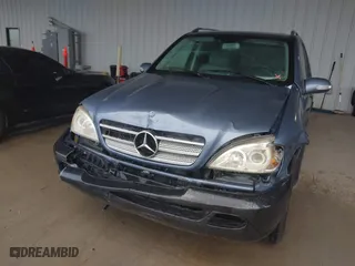 2005 Mercedes-Benz M-Class 3.7L with VIN 4JGAB57E25A560516, listed as a IAAI auction lot 41898369 with 125,927 mi miles. Bid and sale history available at carsss.com. Image 6.